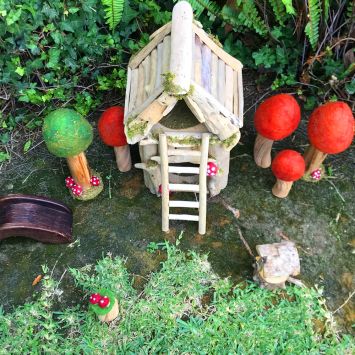 Wooden fairy house builds imagination